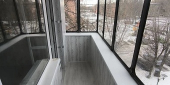 Отделка ламинатом, утепление передней части, монтаж чернового пола  